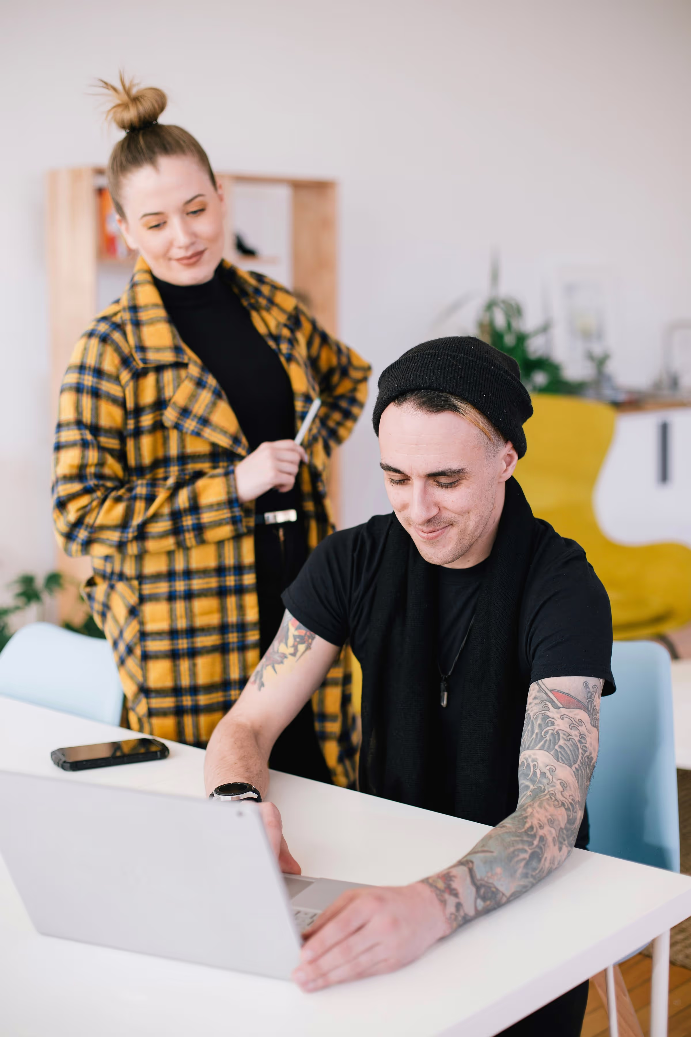 man and woman working together