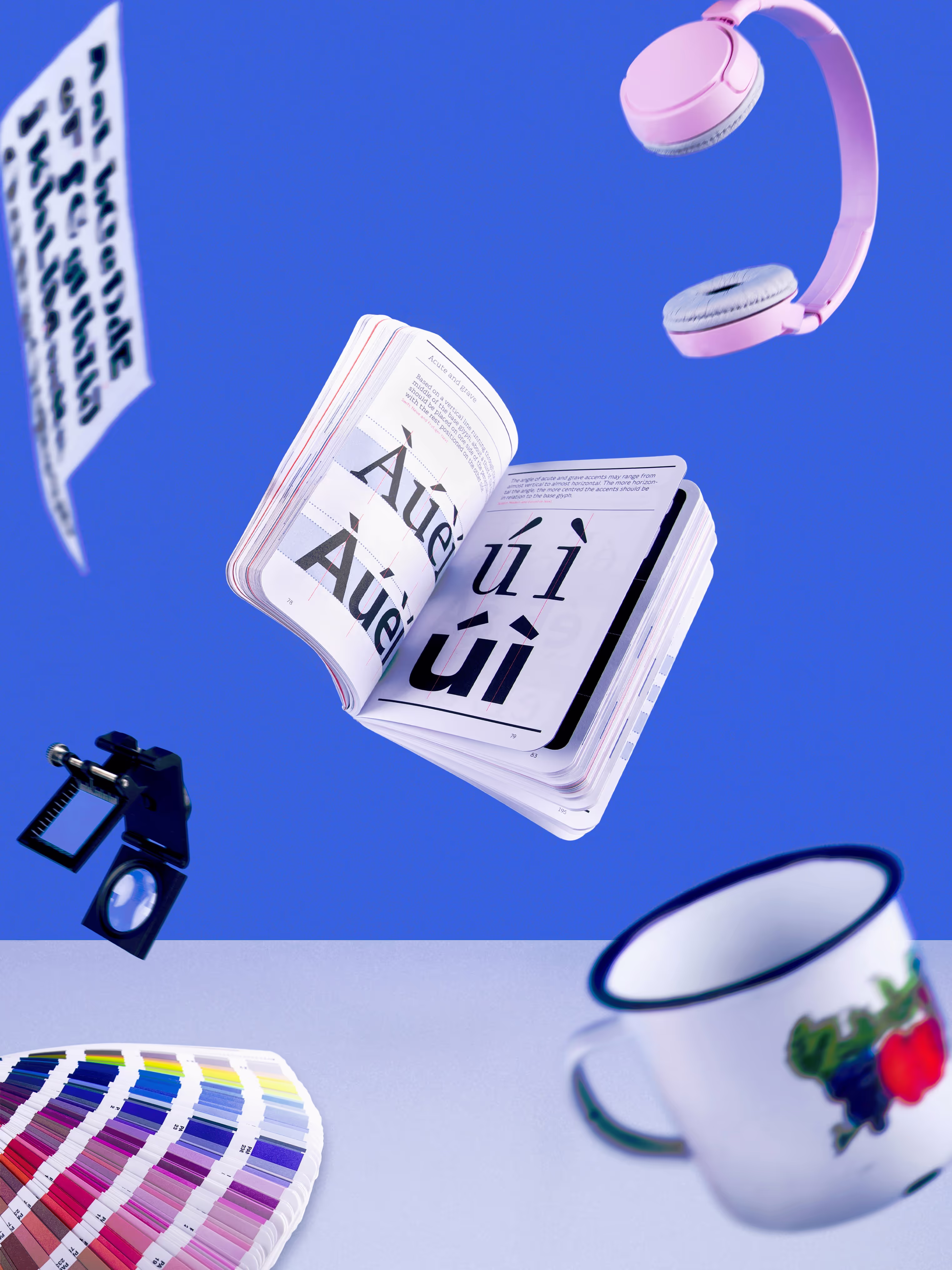 book, headset and a mug